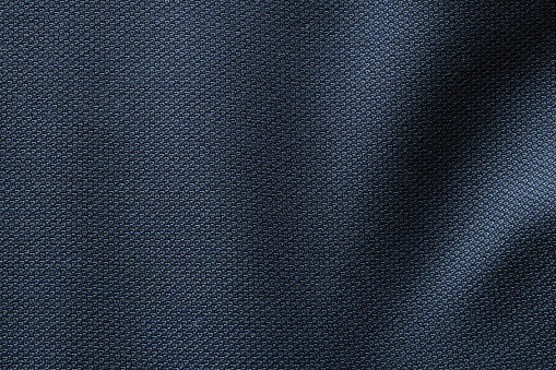 Primer plano de medianoche azul oscuro traje formal traje superficie textil. textura de tela de lana para un evento importante de lujo nocturno o nocturno. Fondo de pantalla y fondo con espacio de copia para texto photo