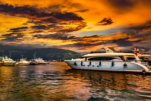 Luxury yachts and storm clouds in the bay of Budva, Montenegro