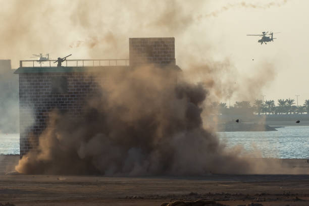 military chopper and army vehicles flying and driving entering into the smoke and war . military concept of power, force, strength, air raid, explosion. - air raid imagens e fotografias de stock