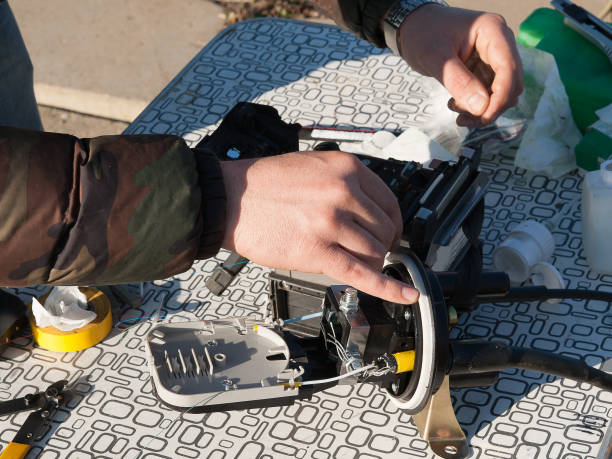istock Welding of optical cable with a special instrument 1203775812