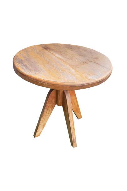 istock An old brown wooden round table. isolate with a white background. 1203776909