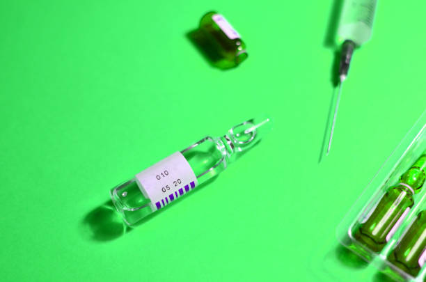 istock Medical syringe with a needle and injection 1203777783