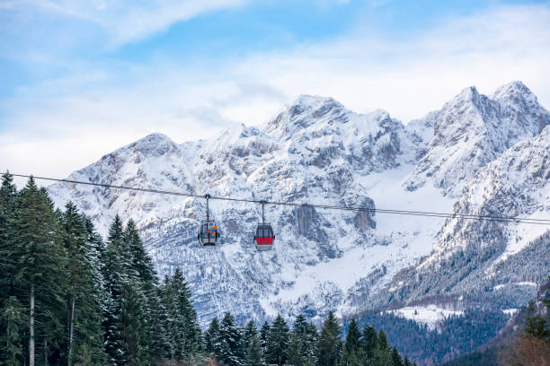 istock Cableway in the snowy Brenta Dolomites - Alps 1203778753