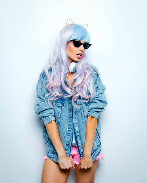 istock Manga style young woman wearing oversized denim jacket 1203778884