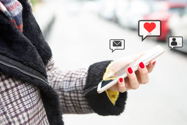 istock Young woman using smart phone 1203781616
