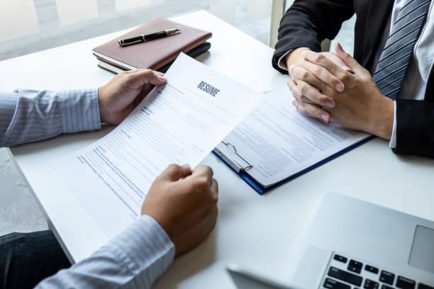 istock Businessman interview consider a resume conversation during about profile of candidate of conducting a job interview listen to answers while sitting at the working meeting in office 1203783476