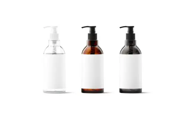 Photo of Blank transparent, amber, black glass bottle with white label mockup