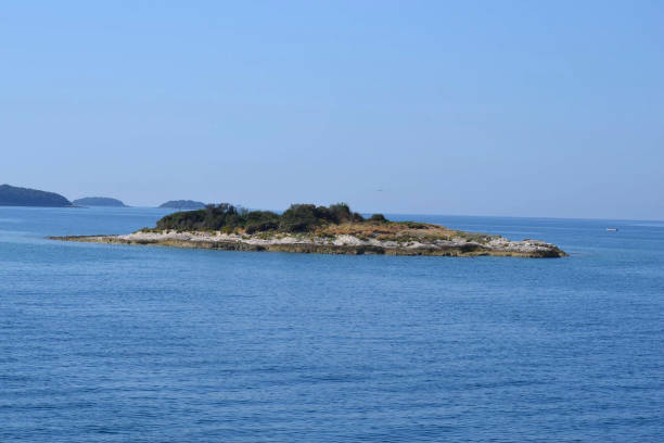 istock a small island in the seal 1203785872