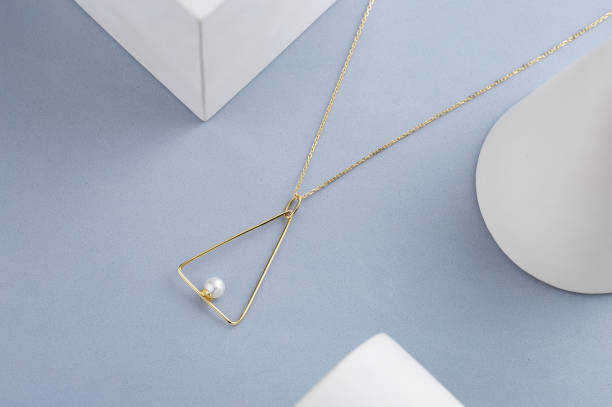 Triangle shape gold pendant necklace with pearl
