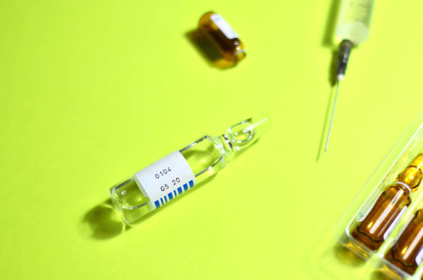 istock Medical syringe with a needle with injection 1203788554
