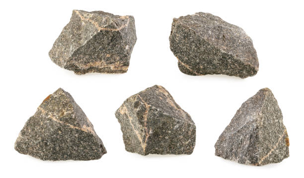 istock Granite stones, rocks isolated on white background 1203789816
