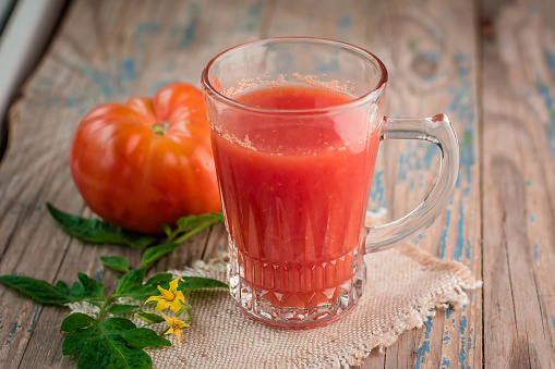 two glasses of freshly squeezed tomato juice