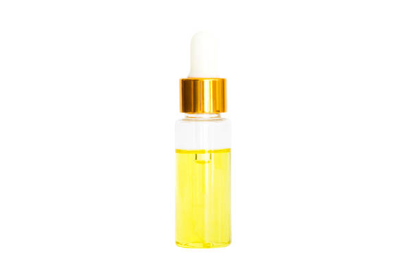 istock Small bottle of perfume isolated on a white background 1203793907