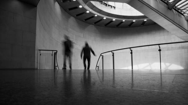 istock Commuters walking in modern station in Paris 1203795641