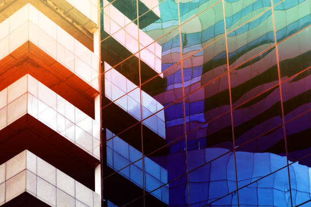 istock colorful Modern exterior architecture detail glass windows building texture 1203798768