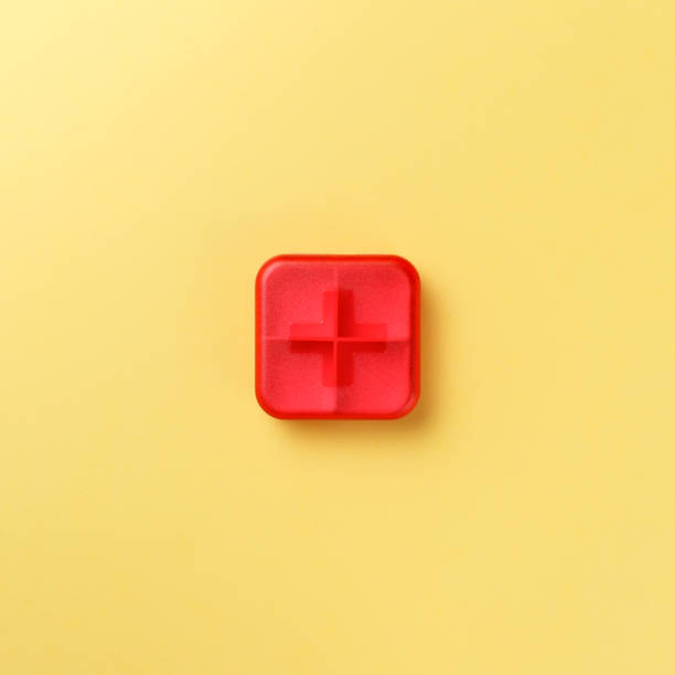 istock Dose pill box with medical pills on yellow background. Top view. Flat lay. Copy space. Pharmaceutical medicine pills, tablets and capsules. Medicine concepts. Trendy pastel color 1203799630