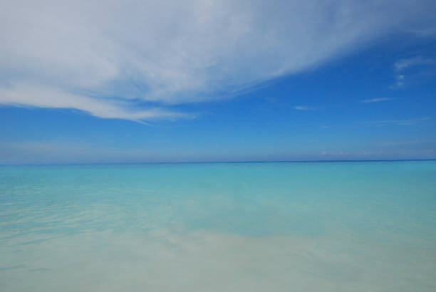istock Light reflect on the sea water with blue sky sea scape 1203800081