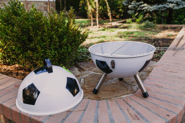 istock Soccer ball shaped metal barbecue 1203801539