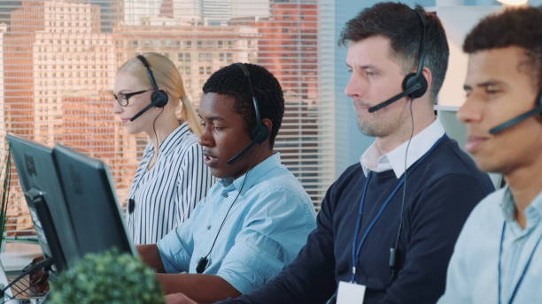istock African customer service representative working on multiracial team of modern call center 1203801868