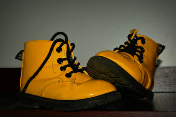 istock Pair of yellow shoes 1203803235