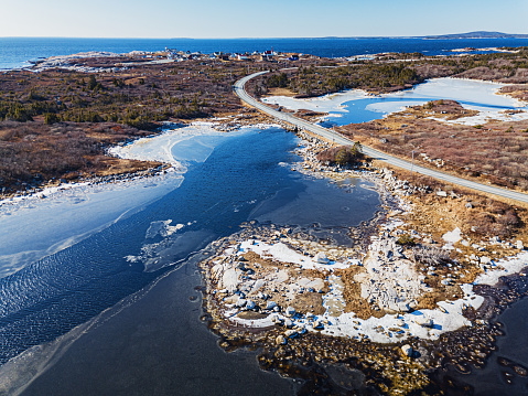 Aerial drone view of coastal highway near Peggy's Cove, Nova Scotia.