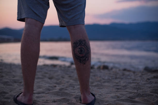 Silhouette Of A Sun Tattoo For Men Stock Photos, Pictures & Royalty-Free  Images - iStock