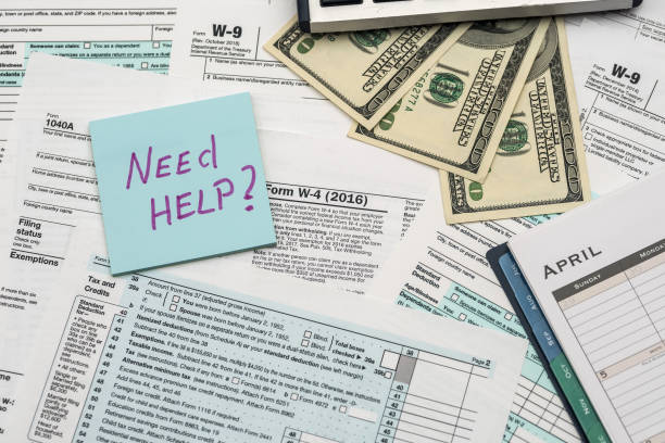 istock Need help text on sticker with 1040 tax form 1203809090