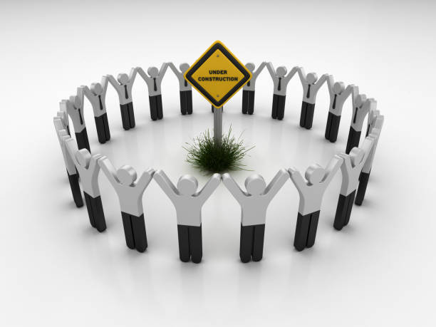 istock UNDER CONSTRUCTION Road Sign with Pictogram Teamwork People - 3D Rendering 1203810073