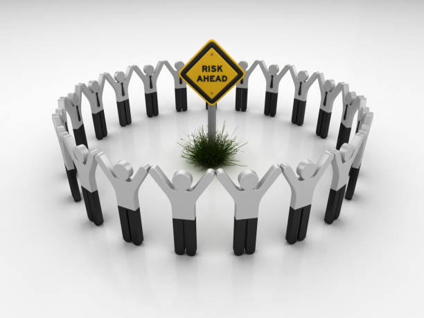 istock RISK AHEAD Road Sign with Pictogram Teamwork People - 3D Rendering 1203810093