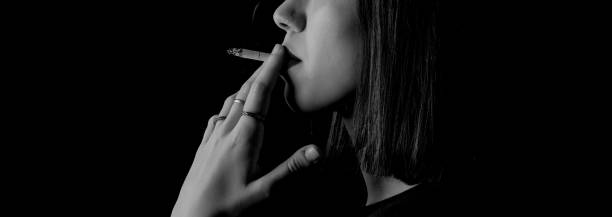 istock smoker woman 1203811327