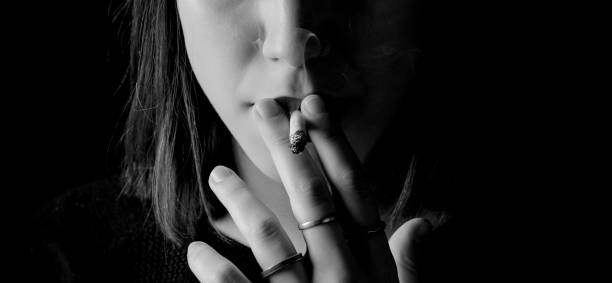 istock smoker woman 1203811431