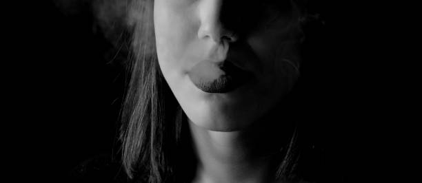 istock smoker woman 1203811591