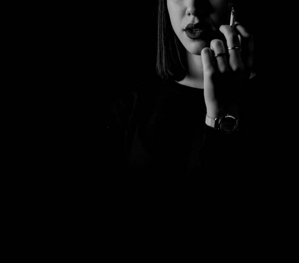 istock smoker woman 1203811659