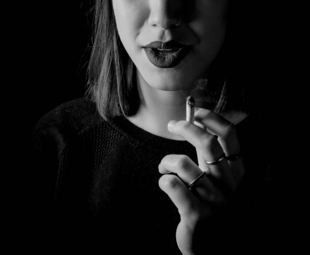 istock smoker woman 1203811830