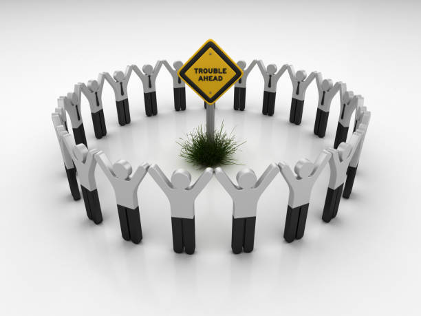 istock TROUBLE AHEAD Road Sign with Pictogram Teamwork People - 3D Rendering 1203812333