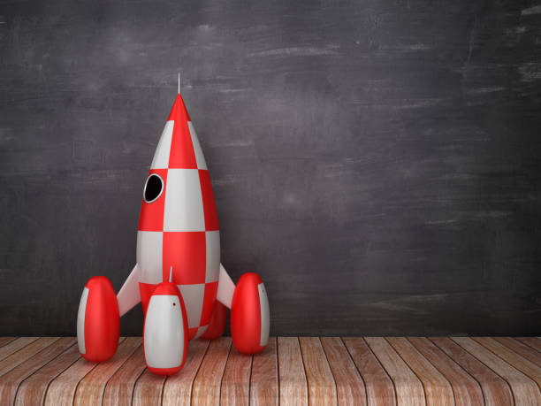 istock Retro Rocket on Wood Floor - Chalkboard Background - 3D Rendering 1203813090