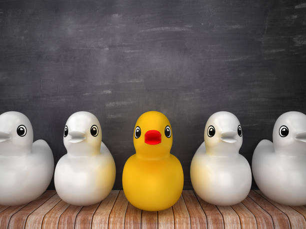 istock Rubber Duck on Wood Floor - Chalkboard Background - 3D Rendering 1203813145