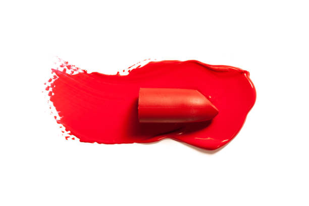 istock Texture of classic red lipstick on a white background close-up. 1203813709