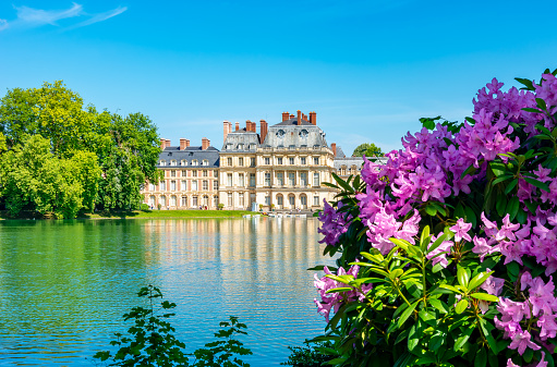 Fontainebleau, France - Msy 2019: Fontainebleau palace (Chateau de Fontainebleau) and park outside Paris in spring