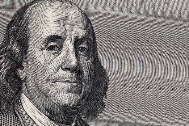 istock fragment of 100 dollar bill 1203816319