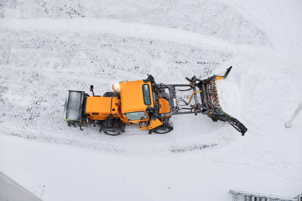 istock Tractor cleans a street after heavy snow. 1203816513