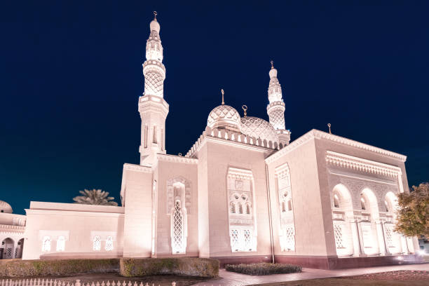 istock Illuminated Jumeirah mosque at night in Dubai, UAE. It is also an educational center for cultural understanding. Muslim religion concept 1203822266