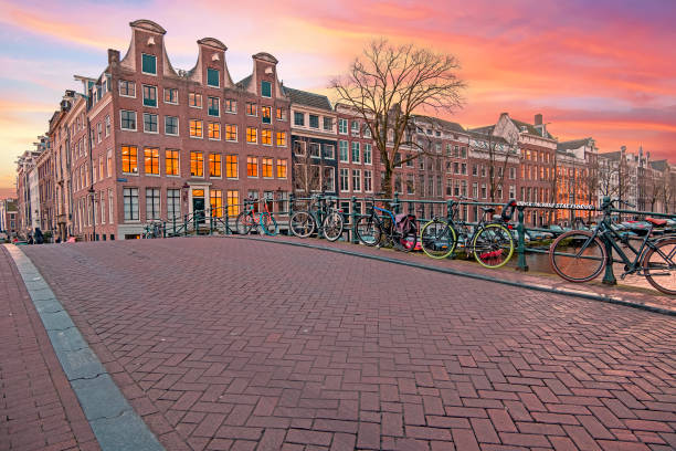 City scenic from Amsterdam in the Netherlands at sunset City scenic from Amsterdam in the Netherlands at sunset jordaan amsterdam stock pictures, royalty-free photos & images