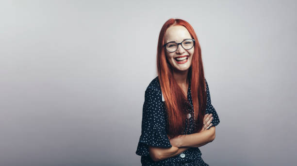 istock Smiling woman with brown hair 1203823444