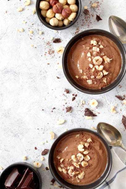 istock Chocolate smoothie with banana and nuts. Protein smoothie. 1203825226