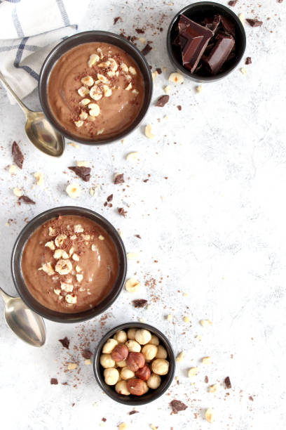 istock Chocolate smoothie with banana and nuts. Protein smoothie. 1203825260