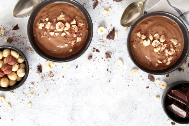 istock Chocolate smoothie with banana and nuts. Protein smoothie. 1203825330