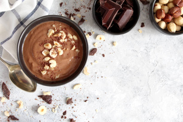 istock Chocolate smoothie with banana and nuts. Protein smoothie. 1203825338