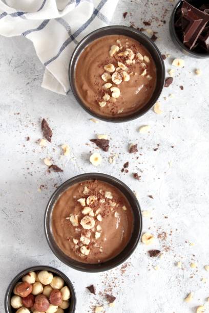 istock Chocolate smoothie with banana and nuts. Protein smoothie. 1203825439