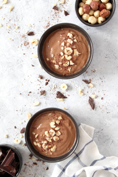 istock Chocolate smoothie with banana and nuts. Protein smoothie. 1203825470